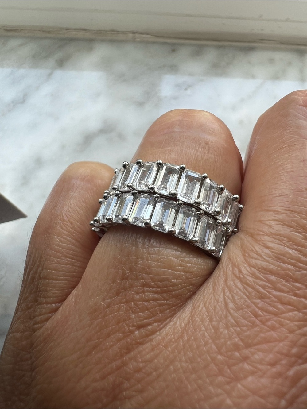 Emerald cut eternity band with high-quality cubic zirconias. Two available!